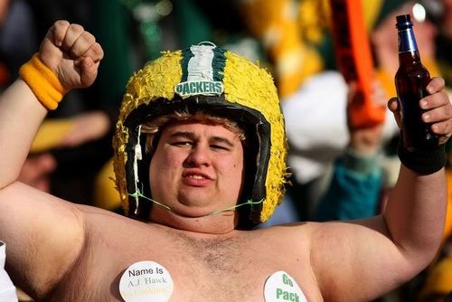 Sloth? Well this guy took the trouble to get out of his couch and go to the arena, and sit there instead… how many couch potatoes watch the NFL?