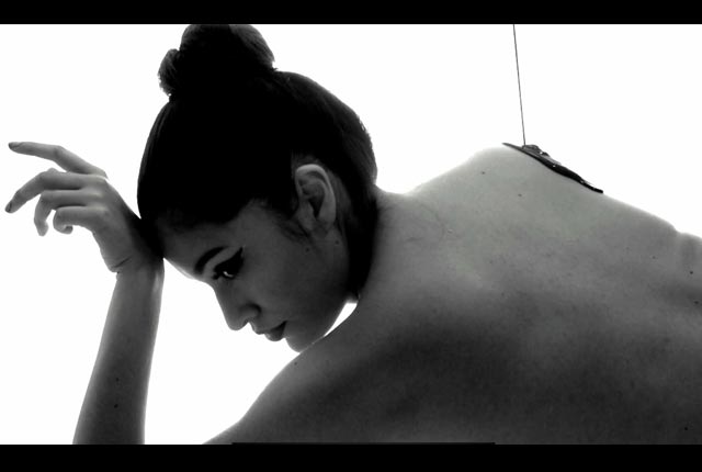 From naked to blackened, she goes from being pure to sullied