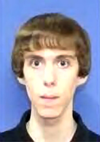 The shooter appears to have a blank, mindless expression. He looks like a mindless drone, however his eyes are open and does appear to be "awake".